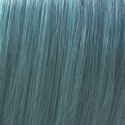 Close-up of rain falling on water surface, creating streaks and a wet look.