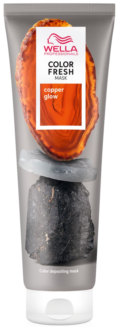 A tube of Wella Color Fresh Mask with a picture of an orange, dark rock, and branding details in white and red.