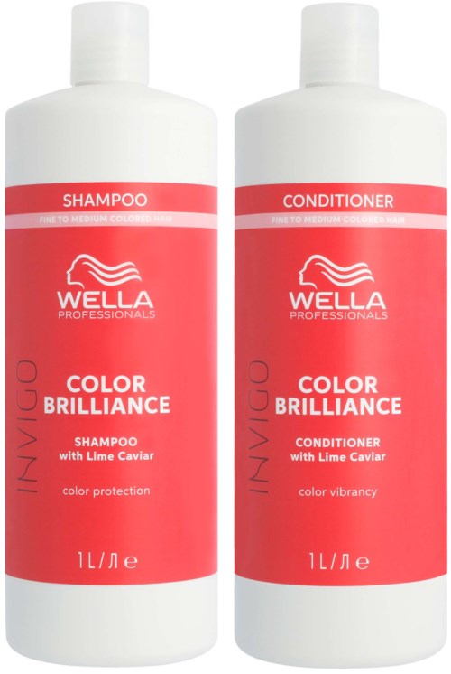 Two white bottles with red labels, one for shampoo and one for conditioner, both with lime caviar for color protection.