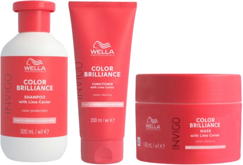 Three hair care products: shampoo, conditioner, and mask, all with lime caviar, in red containers.