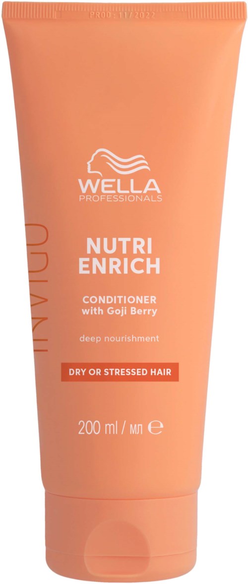 Ein pfirsichfarbener Wella Nutri Enrich Conditioner für trockenes oder gestresstes Haar mit Goji Berry, 200 ml.