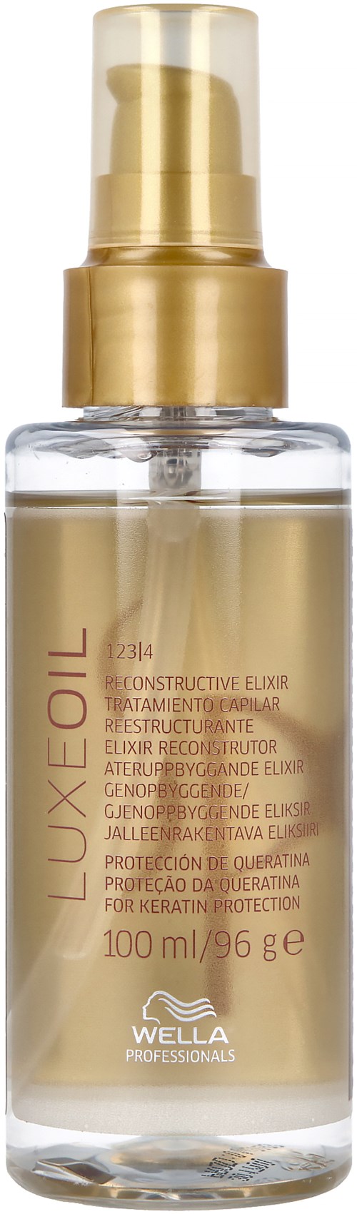 A clear bottle with gold and white labeling and a gold pump, containing Lux Oil treatment for hair.