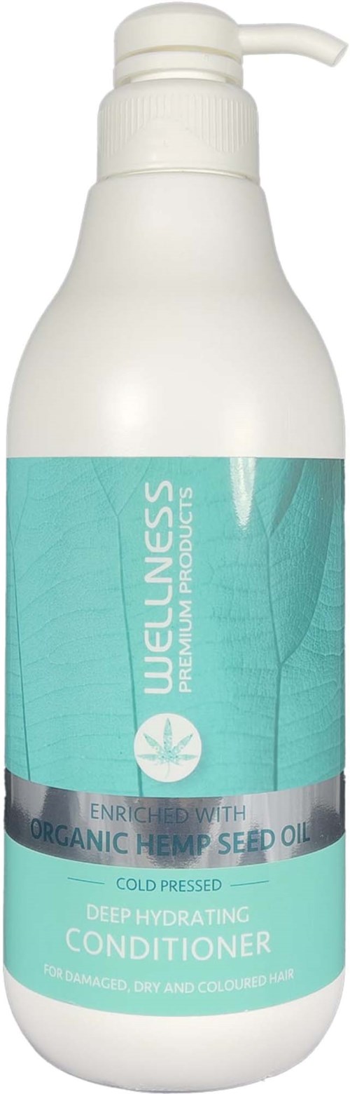 Eine weiße Flasche mit Pumpe, mit Wellness Bio-Hanföl Conditioner für geschädigtes, trockenes und coloriertes Haar.