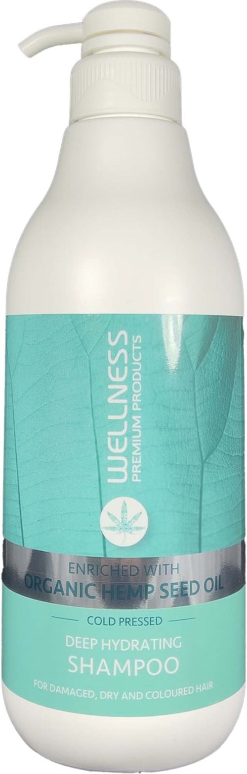 Eine weiße Shampoo-Flasche mit einer blauen Etikette, die angibt, dass sie mit organischem Hanfsamenöl angereichert ist, für geschädigtes Haar.