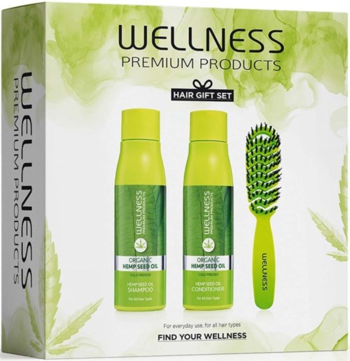 Green shampoo and conditioner bottles with a green hairbrush in a box, promoting hemp seed beauty products.
