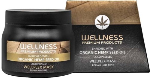 Black jar and box with hemp seed oil hair mask label, leaf logo, and brown and black packaging.