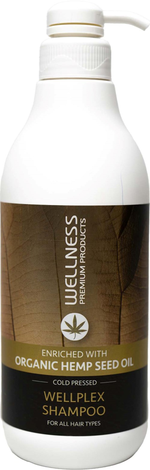 Eine weiße Flasche mit Pumpe, als Bio-Hanfkernöl-Shampoo für alle Haartypen gekennzeichnet.