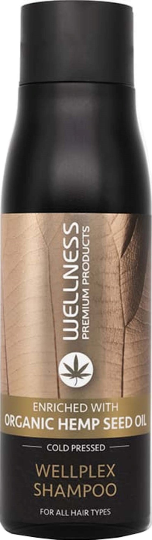 Eine schwarze Flasche mit beiger Etikett, die WELLNESS-Shampoo mit Bio-Hanföl bewirbt.