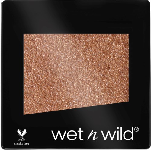 A makeup palette with a glittery, bronze-colored eyeshadow inside a black case.