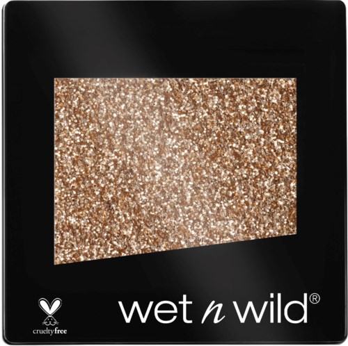 A glittery, gold-colored makeup product with black packaging and 'wet n wild' branding.