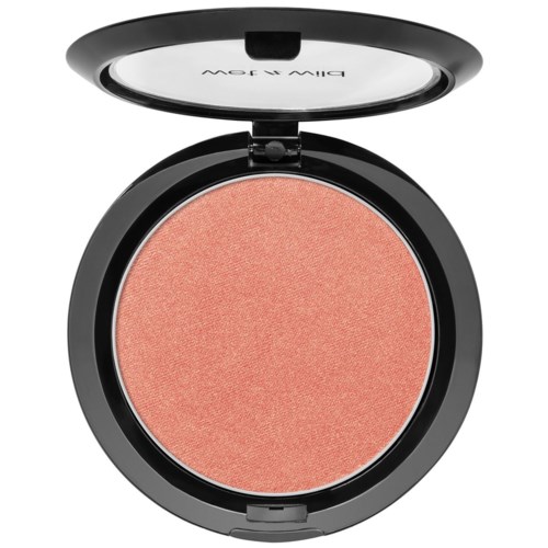 Ein runder Make-up-Blush mit schwarzer Hülle und Spiegel auf dem Deckel.