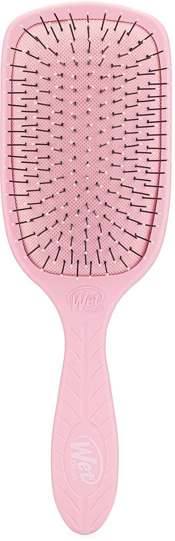 Eine rosa Bürste mit vielen schwarzen nagelähnlichen Stacheln und einem Griff mit WAP-Logo.
