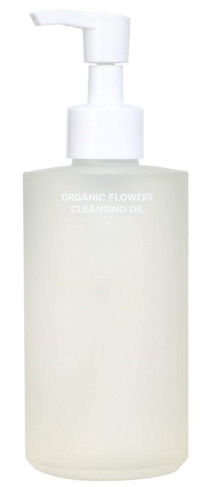 Eine weiße Flasche mit Pumpaufsatz, beschriftet 'Organic Flowers Cleansing Oil'.