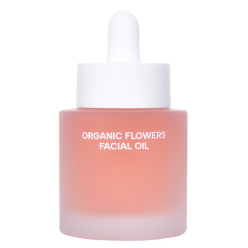 Pinke Flasche mit Pipette, beschriftet 'Organic Flowers Facial Oil'.