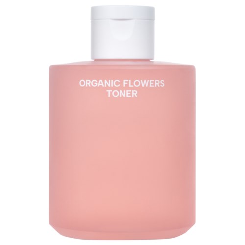 Een roze fles met witte dop, label 'Organic Flowers Toner'. Eenvoudig en schoon ontwerp.