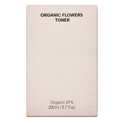 Een beige doos met 'Organic Flowers Toner' en kleine embossed stippen aan de rechterkant.