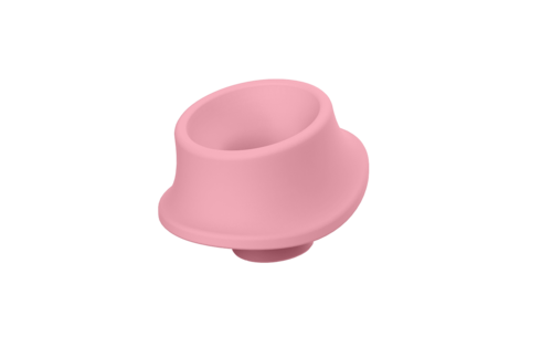 Ein kleiner rosa Silikonring, möglicherweise eine Schutzabdeckung oder eine verschüttete Silikonteil, isoliert vor schwarzem Hintergrund.