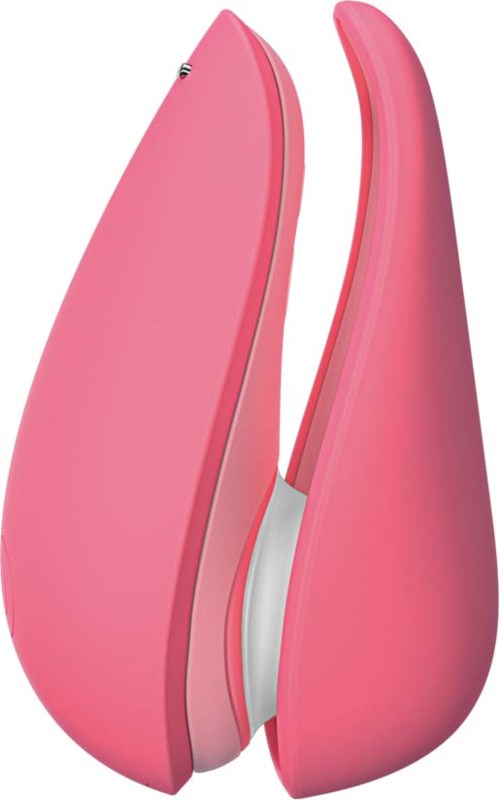 A pink device with two parts that look like petals, likely a massager or personal care gadget.