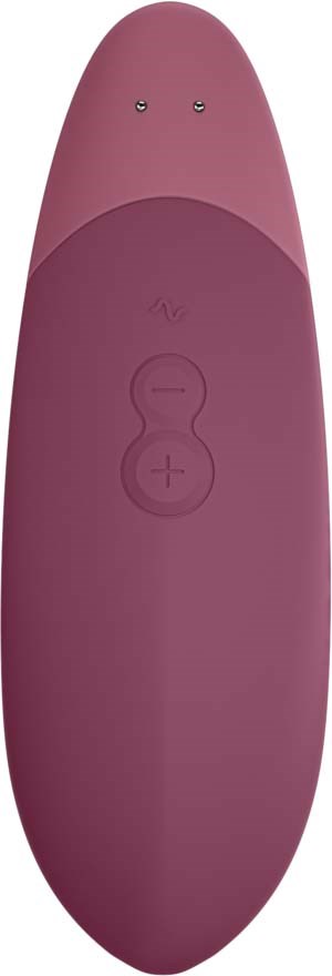 Eine pinke Fernbedienung mit drei Tasten: plus, minus und eine Power- oder Home-Taste.
