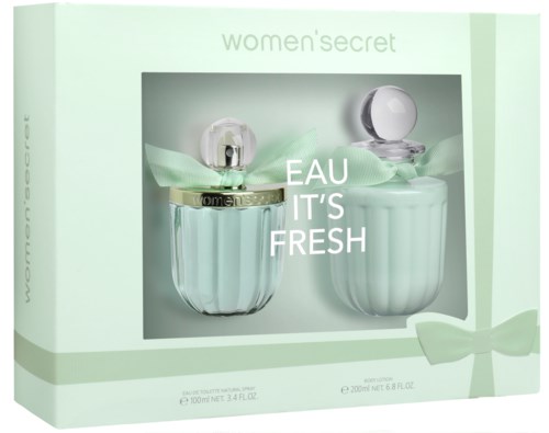 Een doos met parfumflessen, een logo en slogan. Lichtgroene kleur, met linten en zachte ontwerp elementen.