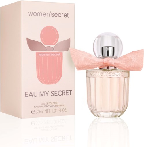Ein Parfümflasche mit rosa Schleife und Blumenmuster neben einer Schachtel mit 'Women Secret Eau My Secret'.