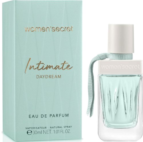 A light blue box and a perfume spray, with a white cap and thin string. The box says "women'secret intimate daydream".