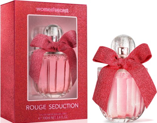 Een parfumfles en doos met rood lint, gemarkeerd Women's Secret Rouge Seduction, 100 ml.