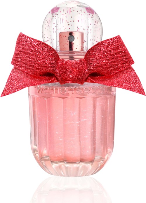 Een roze parfumfles met een grote glanzende rode strik bovenop en een doorzichtige ronde dop.