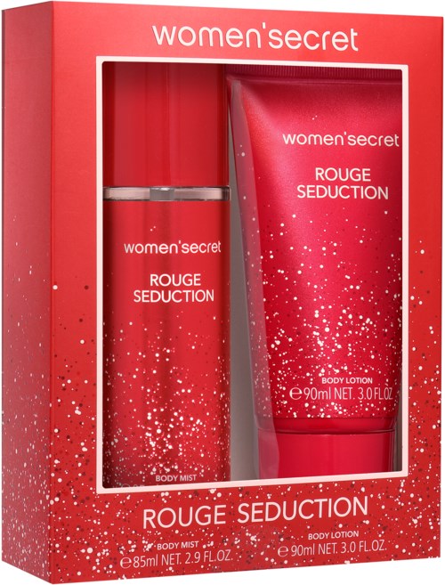 Een rood doosje met een body mist en lotion, beide gemarkeerd 'Rouge Seduction' van Women's Secret, met glinsterend ontwerp.