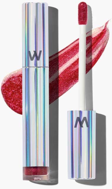 A tube of shiny lipstick with a matching applicator and a red, glittery smear behind them.