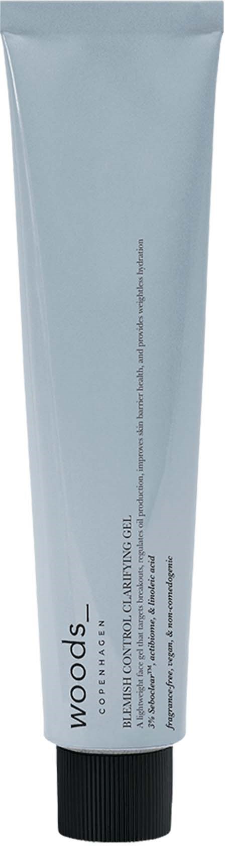 Ein hellblauer Tube mit schwarzem Deckel, mit 'WOOD'S' beschriftet. Enthält Hautpflege- oder Schönheitsprodukt.