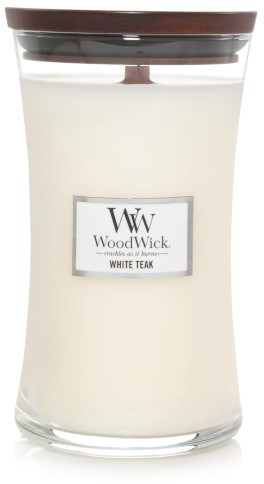 Valkoinen tuoksukynttilä lasipurkissa, jossa on ruskea kansi ja etiketti 'White Teak' ja 'WoodWick.'