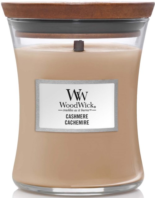 Beige-sävyinen kynttilä lasipurkissa, jossa puuliekki ja etiketti 'Cashmere Cachemire' teksti.