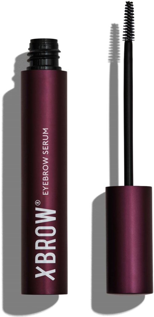 Een paarse wenkbrauwserum tube met mascara borsteltje ernaast, beide werpen schaduw.