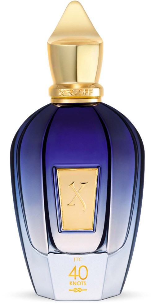 A perfume bottle with a dark blue body, gold cap, and a label with a logo and '40 knots' text.