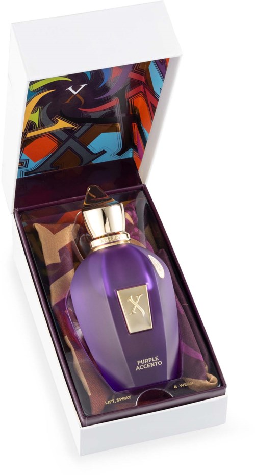 Een paarsepaneel in paars met gouden dop in een kleurrijk doosje, gemarkeerd 'Purple Accento.'