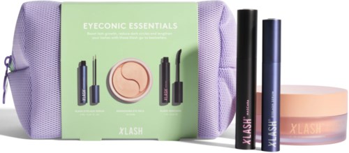 Een make-up reisset met een paarse tas, mascara, eyeliner, blush en een ronde container, allemaal met XLASH-label.