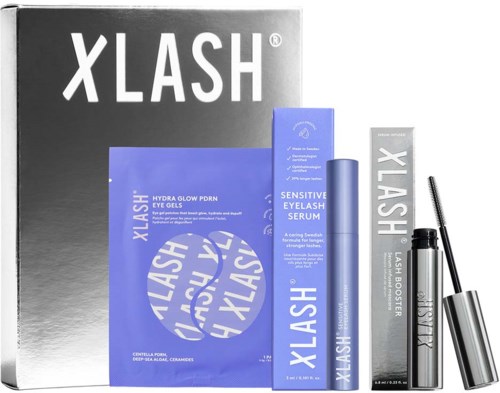 Xlash skincare set includes gel, serum, and booster in blue packaging with white text.
