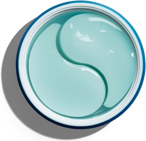 Een ronde container met blauwe gel binnenin, verdeeld in twee gedeeltes door een lijn, werpt een schaduw.