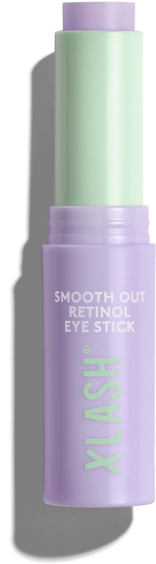 Een paarse oogverzorgingsstick met groene punt, gelabeld 'Smooth Out Retinol Eye Stick,' staand rechtop.