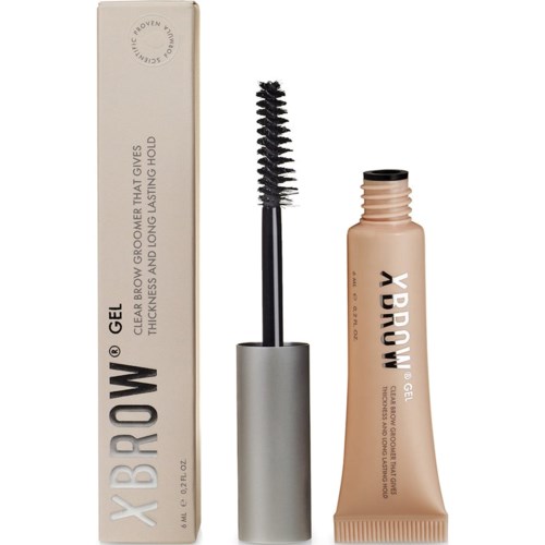 Een mascara tube en borstel met verpakking die productinformatie en merknaam toont.