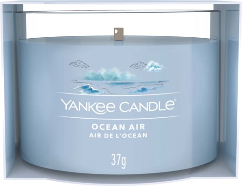 En Yankee Candle ocean air duftlys med bølge- og skyillustrasjoner, veier 37 gram.