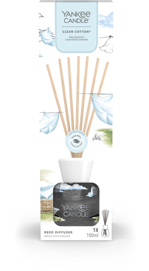 Yankee Candle reed diffuser met katoen geur, stokjes in houder, verpakking toont wolken en bladeren.
