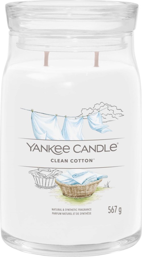 Ett Yankee Candle-glas med doft av rent bomull, med symboler av tvätt som hänger och en korg.