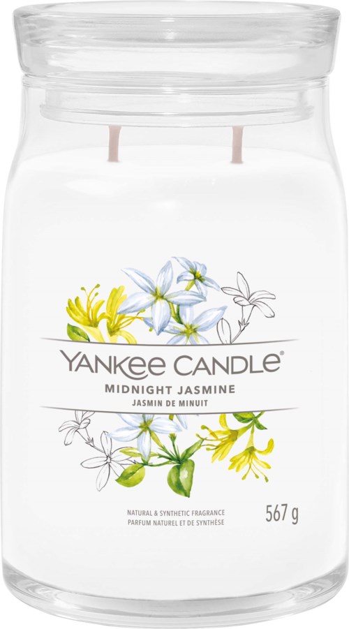 Een witte kaarsenpot met gele en blauwe bloemenillustraties, gemerkt "Yankee Candle Midnight Jasmine", weegt 567 gram.