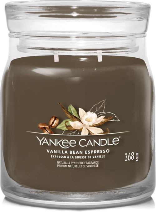 A dark brown Yankee Candle jar with vanilla bean flowers on the label, stating it weighs 368 grams.