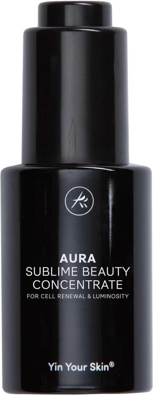 Musta pullo, jossa pumppupää, nimeltään Aura Sublime Beauty Concentrate