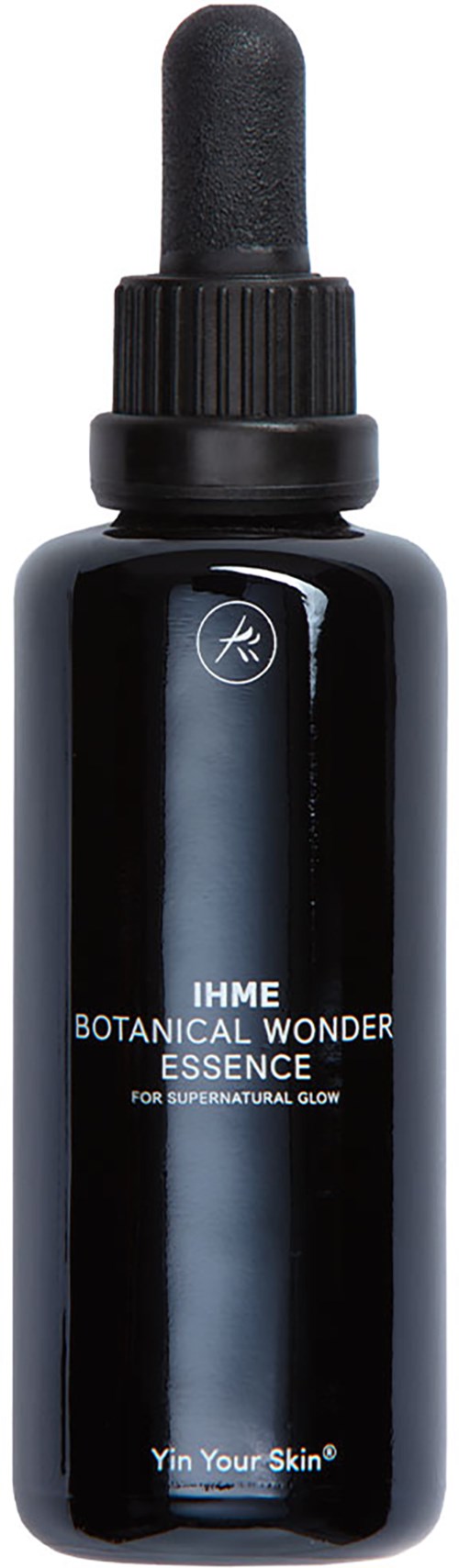 Mustavalan tippo pullo nimeltä IHME Botanical Wonder Essence hehkua varten, musta kansi ja selkeä tippo.