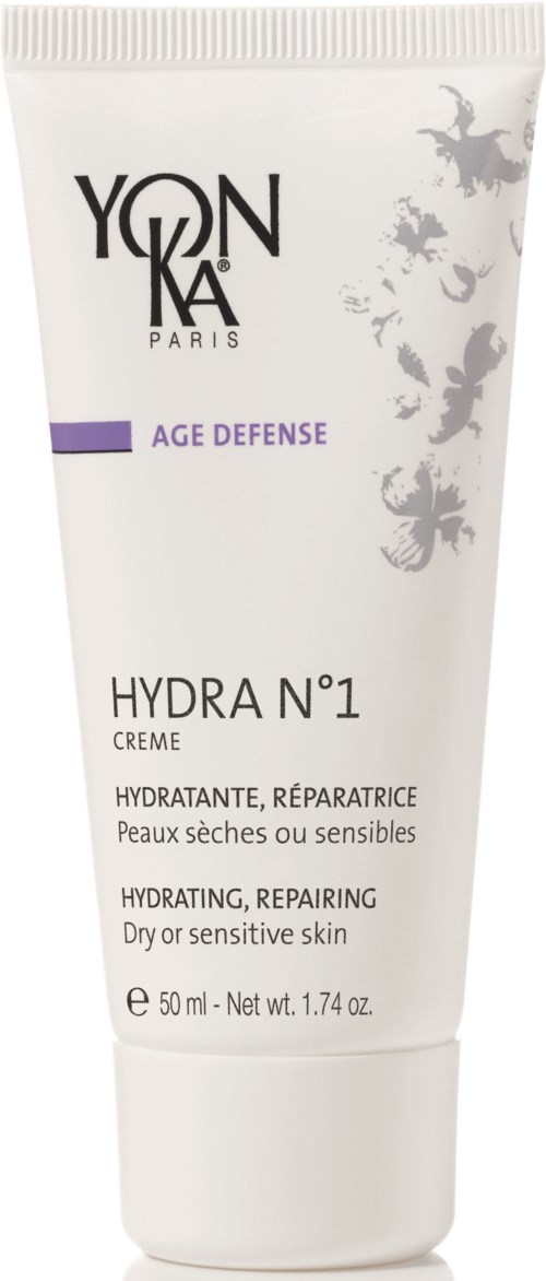 Weiße Tube eines Yon-Ka Paris Hautpflegeprodukts, beschriftet Hydra N°1, für trockene oder empfindliche Haut, mit lila Streifen und Pflanzenmuster.