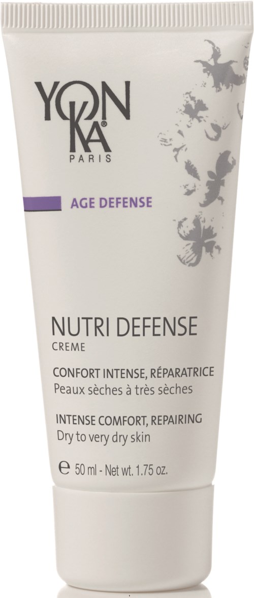 Eine weiße Tube Yon-Ka Nutri Defense Creme für sehr trockene Haut mit lila Etikett und schwarzem Text.